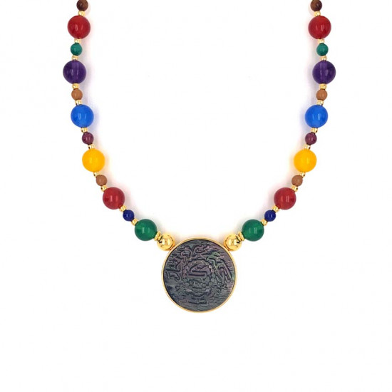A necklace made of Saudi pound shell with colored agate , amethyst, pink quartz, coral, malachite, garnet stones, lapis, and Coke A necklace made of Saudi pound shell with colored agate , amethyst, pink quartz, coral, malachite, garnet stones, lapis, and Coke