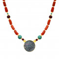 A NECKLACE MADE OF SAUDI POUND SHELL WITH CORAL, RUBY AND TURQUOISE