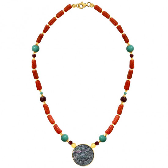 A NECKLACE MADE OF SAUDI POUND SHELL WITH CORAL, RUBY AND TURQUOISE