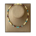 TURQUOISE NECKLACE WITH HEMATITE, RUBY, YELLOW SHELL AND AMBER TURQUOISE NECKLACE WITH HEMATITE, RUBY, YELLOW SHELL AND AMBER