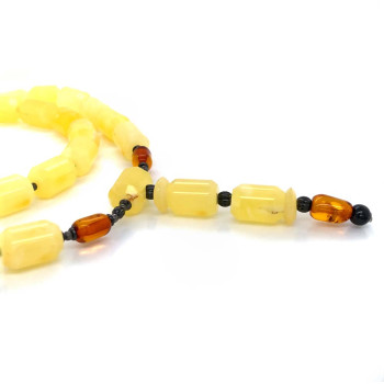 CYLINDRICAL YELLOW AMBER BEARISH WITH HONEY COLORED AMBER