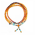 ROSARY OF AMBER, TURQUOISE, TIGER’S EYE & YELLOW HEMATITE