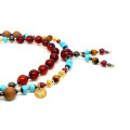 MEN’S ROSARY OF DARK AMBER, TURQUOISE, TIGER’S EYE & SANDALWOOD