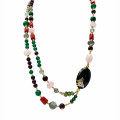 OBSIDIAN NECKLACE WITH GREEN JADE, GREEN PREHNITE, FACETED RUBY AGATE, LABRADORITE, RED CORAL, AND PINK QUARTZ OBSIDIAN NECKLACE WITH GREEN JADE, GREEN PREHNITE, FACETED RUBY AGATE, LABRADORITE, RED CORAL, AND PINK QUARTZ