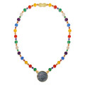 A necklace made of Saudi pound shell with colored agate , amethyst, pink quartz, coral, malachite, garnet stones, lapis, and Coke A necklace made of Saudi pound shell with colored agate , amethyst, pink quartz, coral, malachite, garnet stones, lapis, and Coke