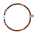 Wood anklet with drawn eye, lapis and coral