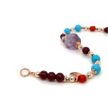 GOLD PLATED TOURMALINE BRACELET WITH GARNET, TURQUOISE AND CORAL