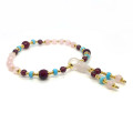 PINK QUARTZ IMAM BRACELET WITH GARNET, TURQUOISE HOWLITE, RUBY AGATE, AND PINK QUARTZ