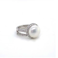 TWIN SILVER RING WITH A LARGE PEARL AND ZIRCON